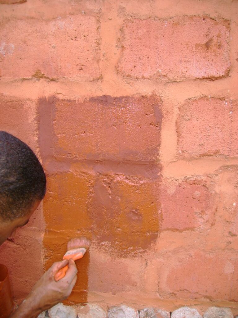 tinta de terra em tijolo de adobe